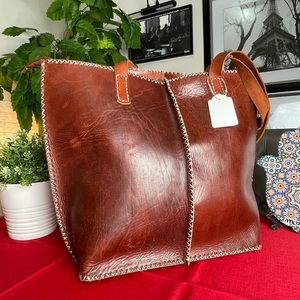 Everyday works leather bags100% leather handmade from Rabat city Morocco .